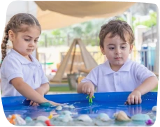 Step by Step Nursery - children playing-water play- eyfs